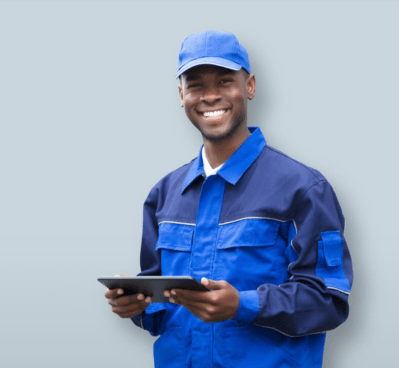 happy young african electrician holding mobile phone