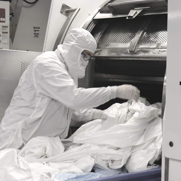 Cleanroom Man Going Through Soiled Cleanroom Garments